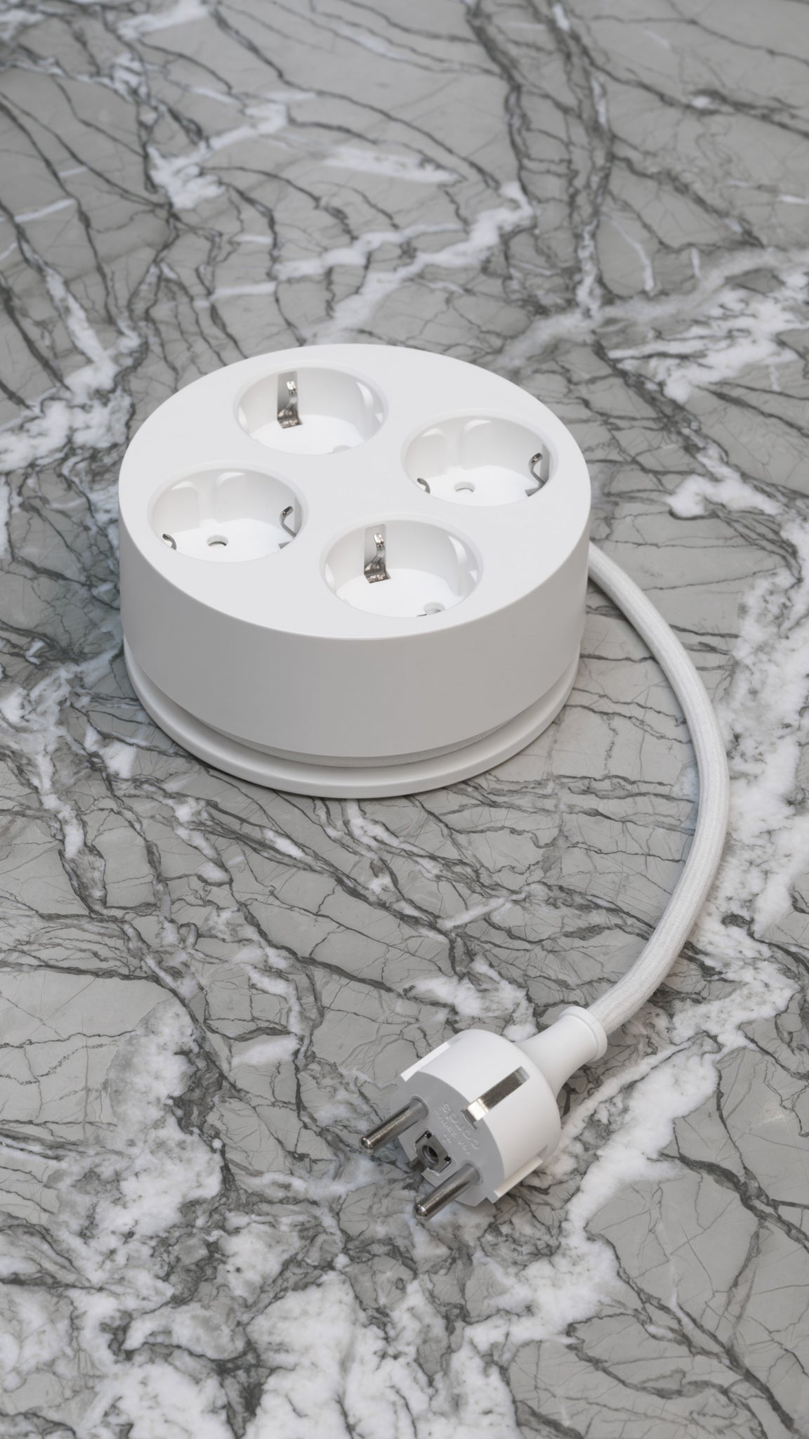 Cords Circular C2 in Sand, overhead on marble