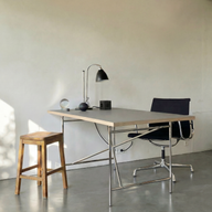 Cords® Cubical C1 Jet Black on a home desk. 